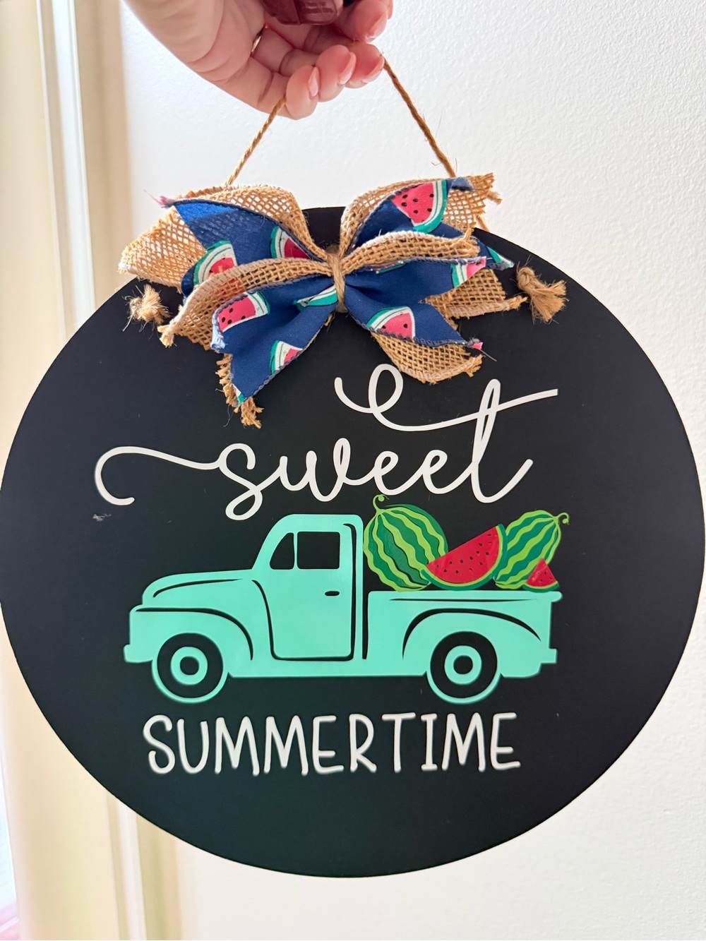Source Unknown Black Sign with Aqua Truck and Watermelon Accents